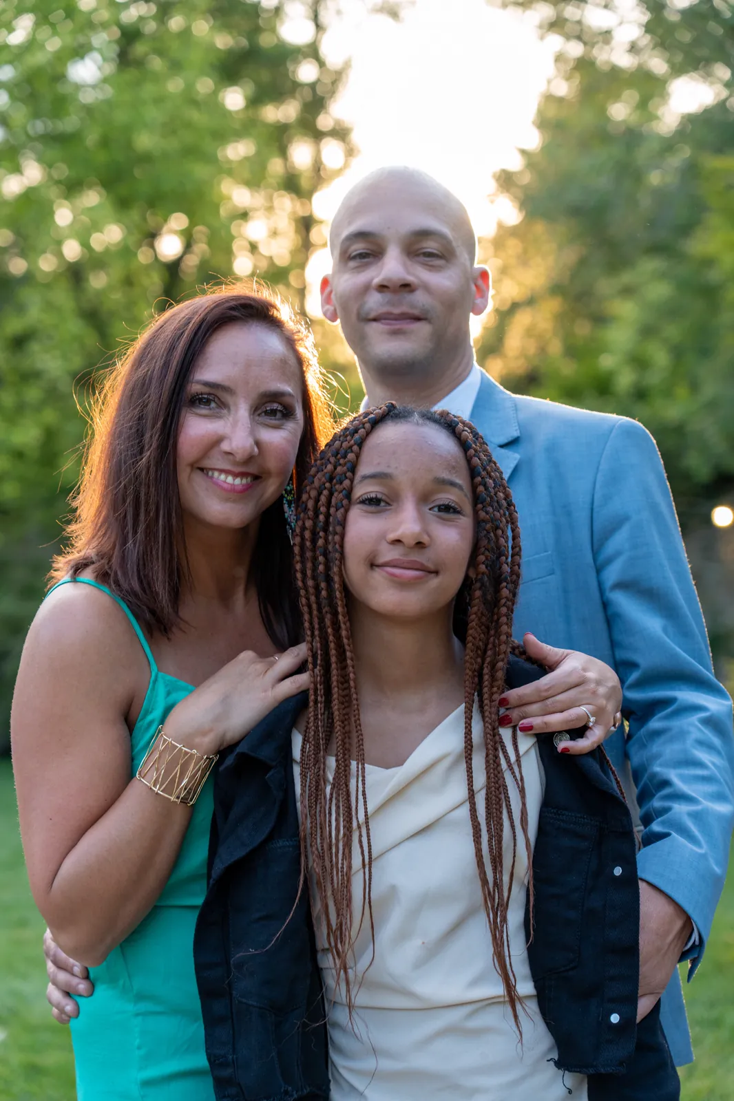 Family portrait in evening light, on a wedding day